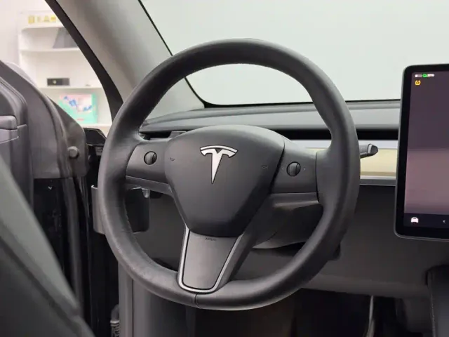 Tesla Model Y — Фото автомобиля 14