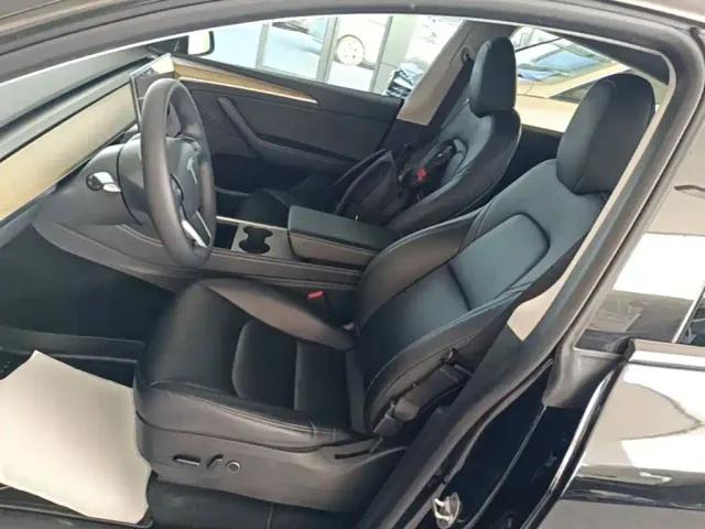Tesla Model Y — Фото автомобиля 14