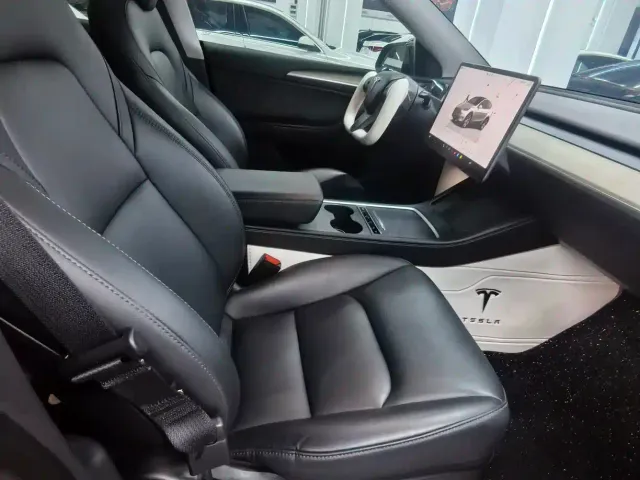 Tesla Model Y — Фото автомобиля 5
