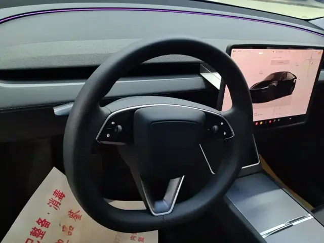 Tesla Model Y — Фото автомобиля 15