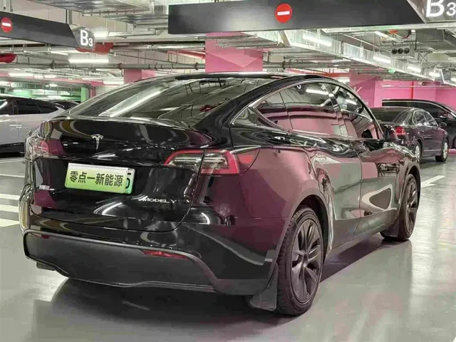 Tesla Model Y — Фото автомобиля 5