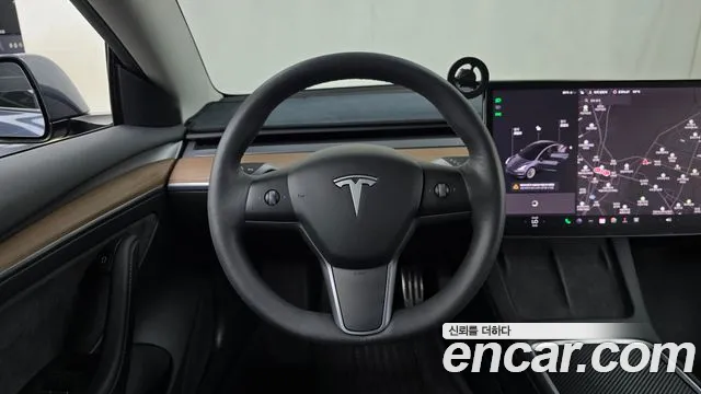 Tesla Model 3 — Фото автомобиля 13