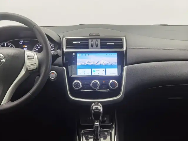 Nissan Tiida — Фото автомобиля 12