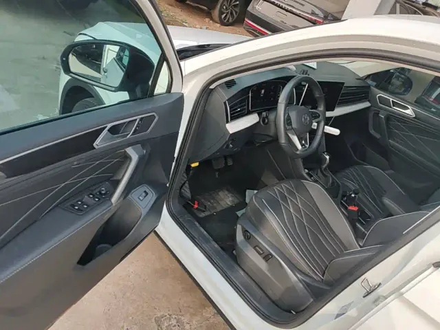 Volkswagen Tiguan L — Фото автомобиля 15