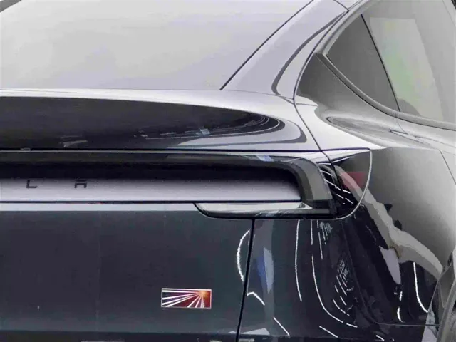 Tesla Model Y — Фото автомобиля 6