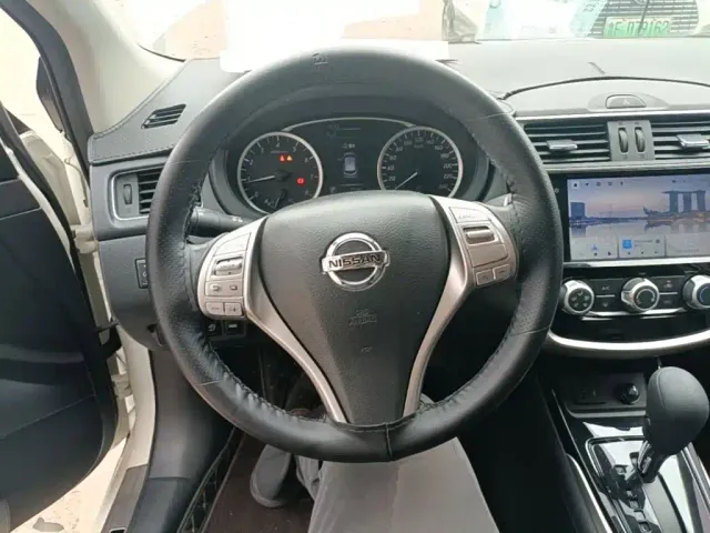 Nissan Tiida — Фото автомобиля 10