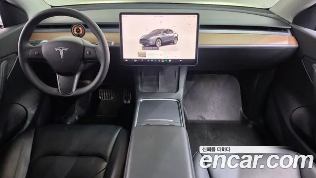 Tesla Model Y — Фото автомобиля 9