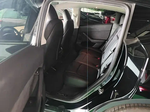 Tesla Model Y — Фото автомобиля 16