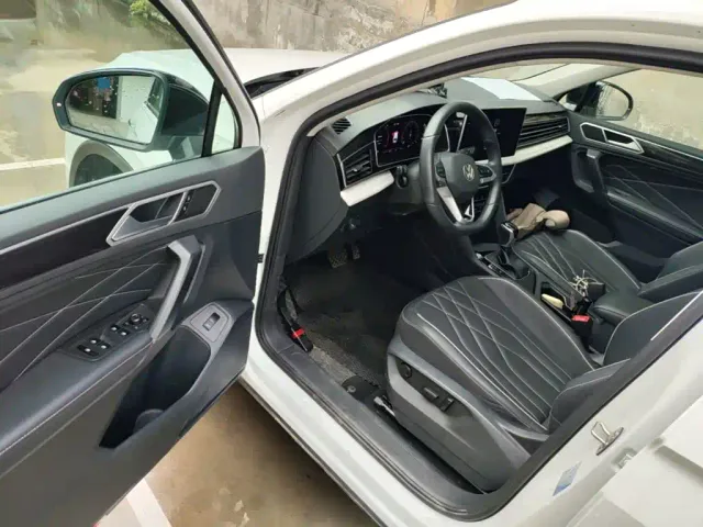 Volkswagen Tiguan L — Фото автомобиля 15