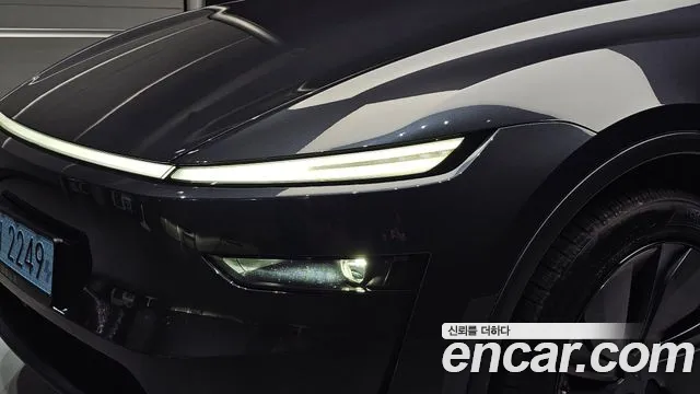 Tesla Model Y — Фото автомобиля 22