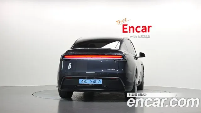 Tesla Model Y — Фото автомобиля 3