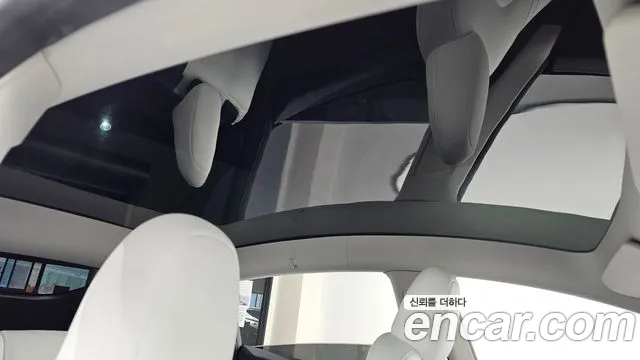 Tesla Model Y — Фото автомобиля 19
