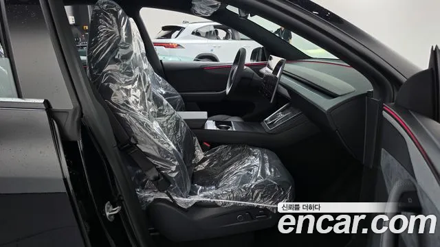 Tesla Model Y — Фото автомобиля 16