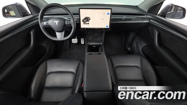 Tesla Model Y — Фото автомобиля 10