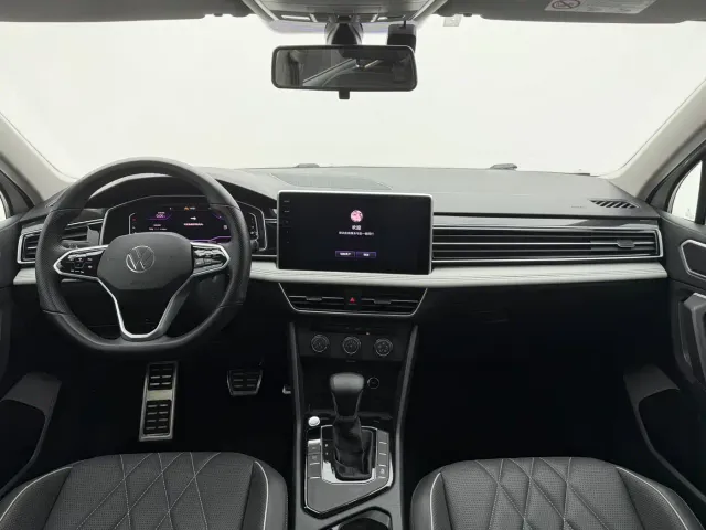 Volkswagen Tiguan L — Фото автомобиля 12