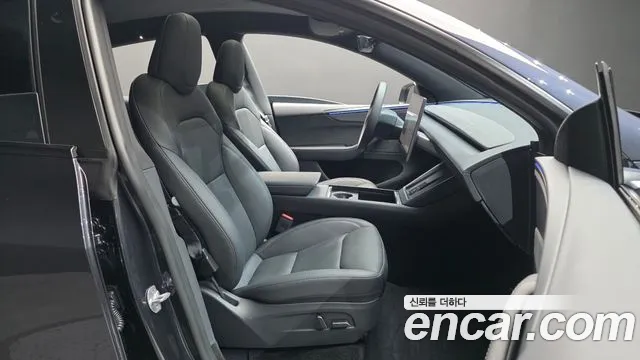 Tesla Model Y — Фото автомобиля 16