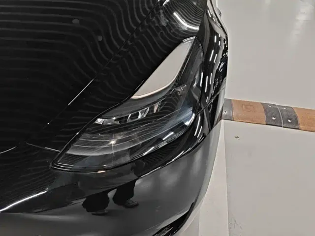 Tesla Model Y — Фото автомобиля 23
