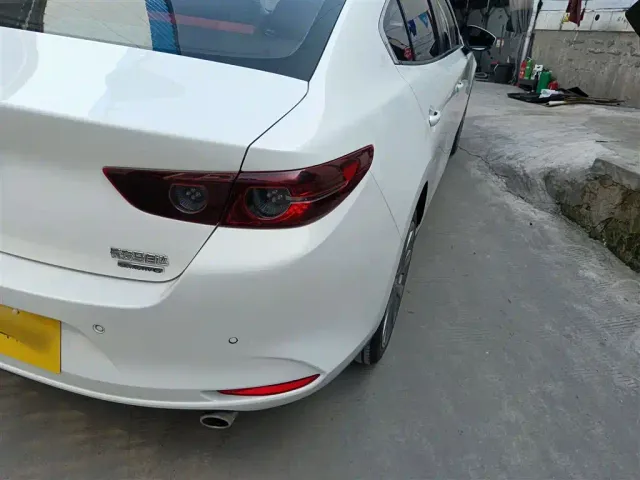 Mazda Axela — Фото автомобиля 23