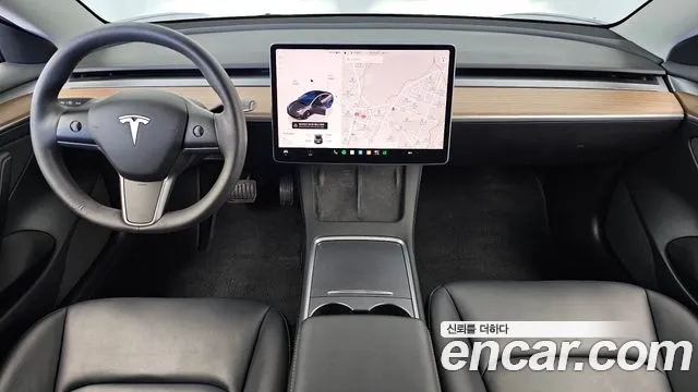 Tesla Model 3 — Фото автомобиля 10