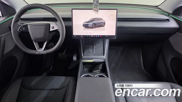 Tesla Model Y — Фото автомобиля 10