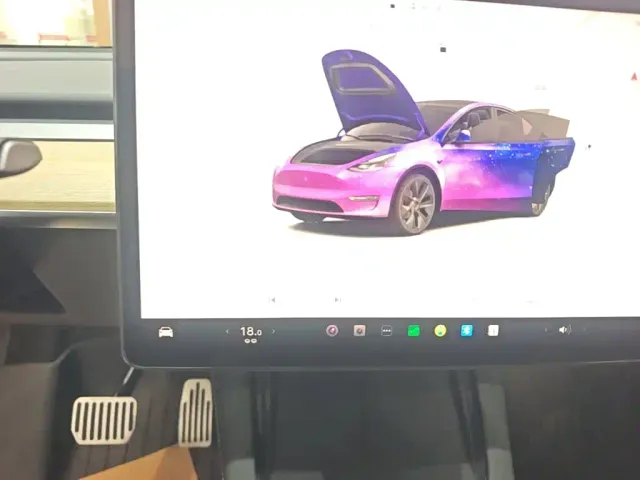 Tesla Model Y — Фото автомобиля 12