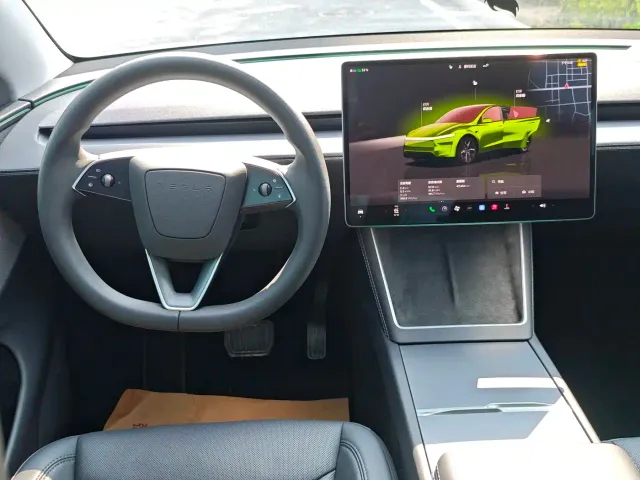 Tesla Model Y — Фото автомобиля 15