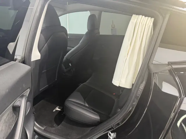 Tesla Model Y — Фото автомобиля 12