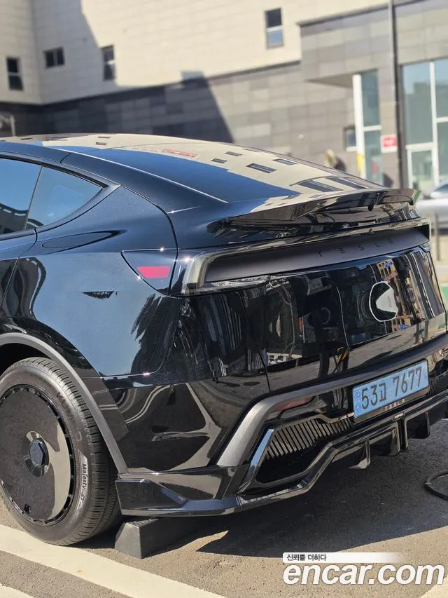 Tesla Model Y — Фото автомобиля 4
