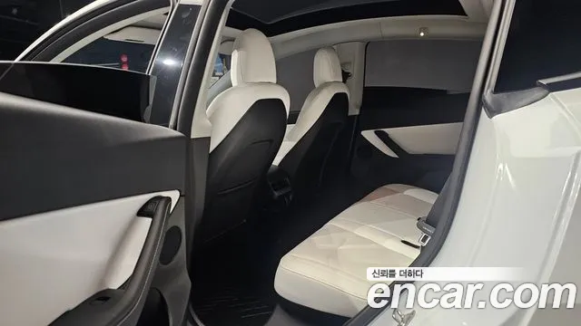Tesla Model Y — Фото автомобиля 14