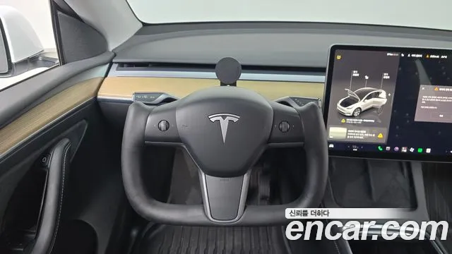 Tesla Model Y — Фото автомобиля 19