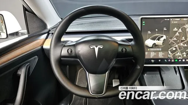 Tesla Model Y — Фото автомобиля 13