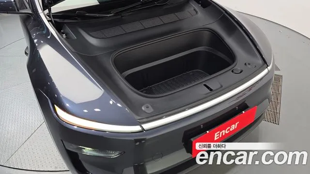 Tesla Model Y — Фото автомобиля 6
