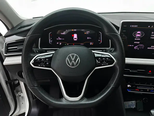Volkswagen Tiguan L — Фото автомобиля 11