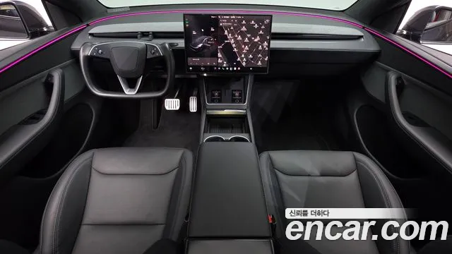 Tesla Model Y — Фото автомобиля 10
