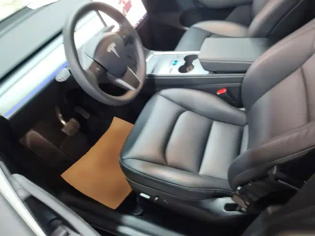 Tesla Model Y — Фото автомобиля 14