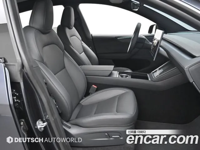 Tesla Model Y — Фото автомобиля 16