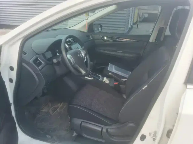 Nissan Tiida — Фото автомобиля 15