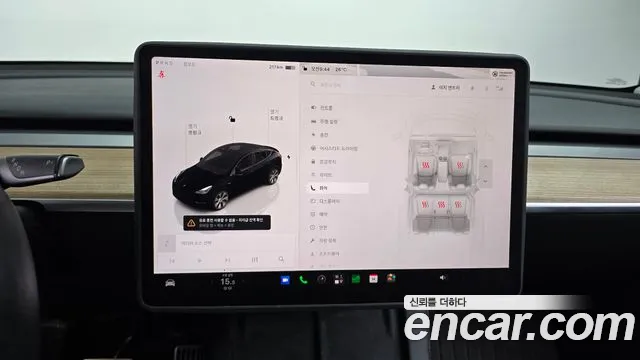 Tesla Model Y — Фото автомобиля 15