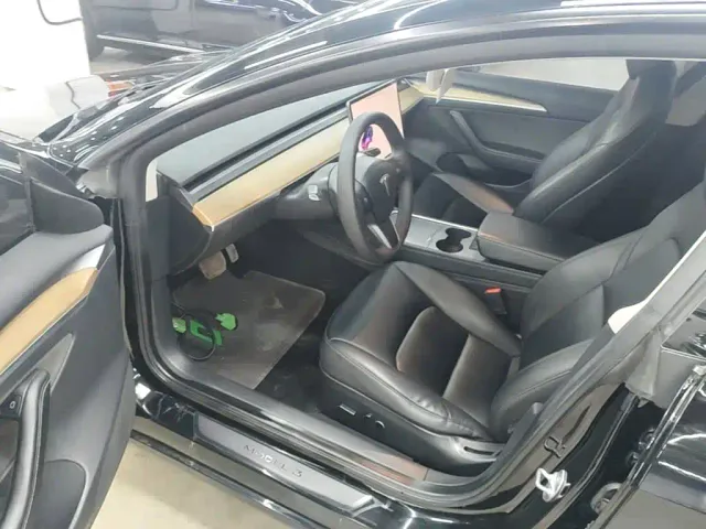 Tesla Model 3 — Фото автомобиля 15