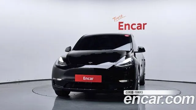 Tesla Model Y — Фото автомобиля 3