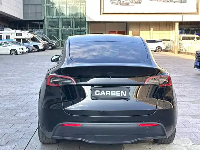 Tesla Model Y — Фото автомобиля 8