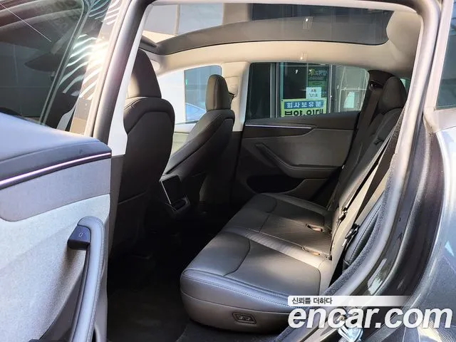 Tesla Model Y — Фото автомобиля 15