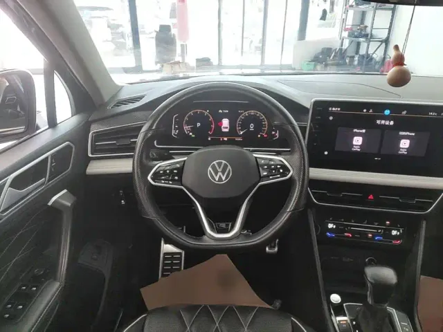 Volkswagen Tiguan L — Фото автомобиля 10