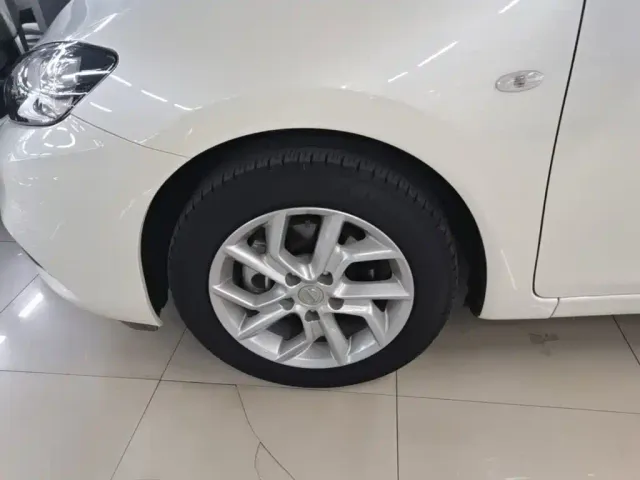 Nissan Tiida — Фото автомобиля 22