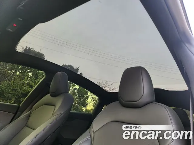 Tesla Model Y — Фото автомобиля 14