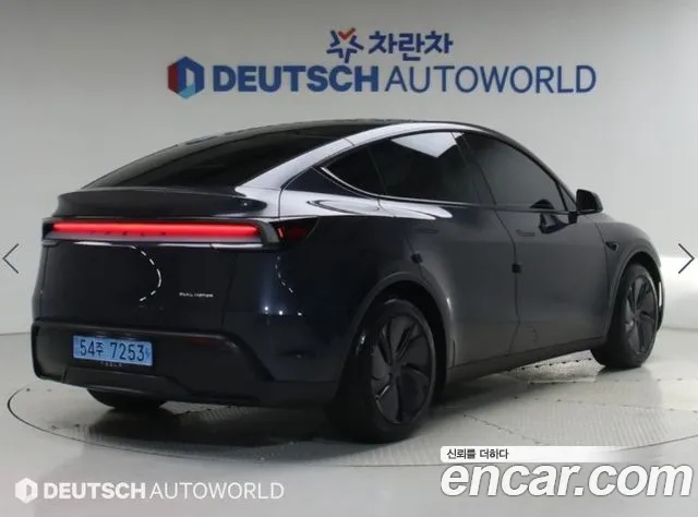 Tesla Model Y — Фото автомобиля 2