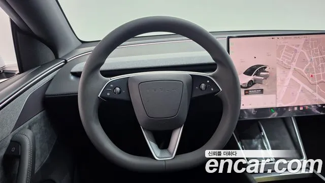 Tesla Model Y — Фото автомобиля 13