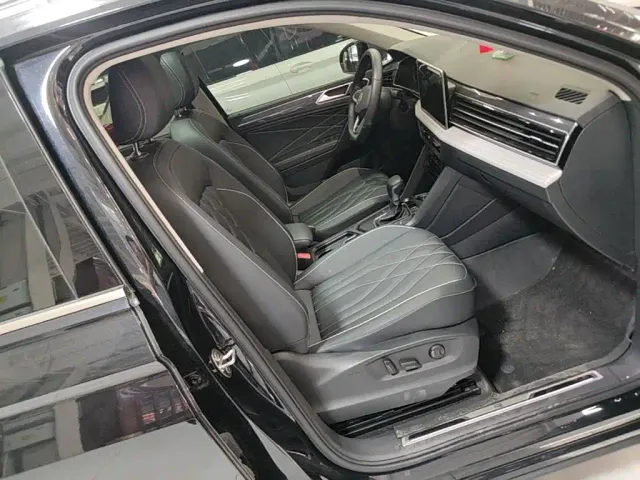 Volkswagen Tiguan L — Фото автомобиля 24