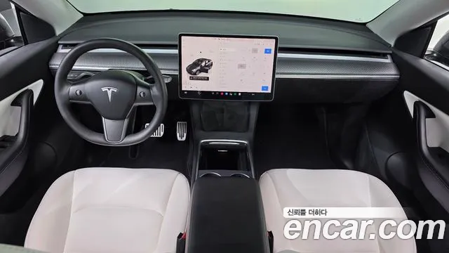 Tesla Model Y — Фото автомобиля 7