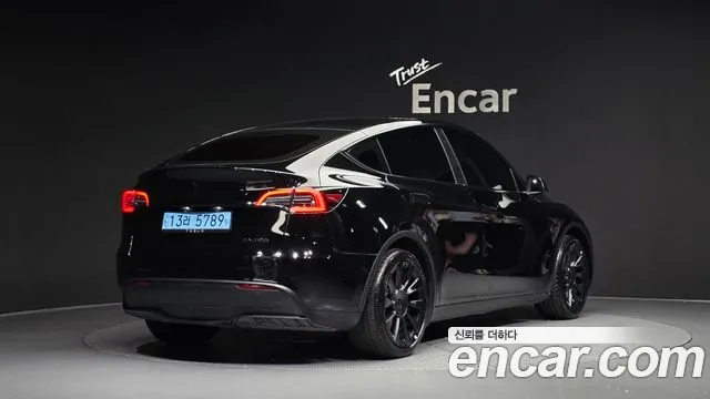 Tesla Model Y — Фото автомобиля 2
